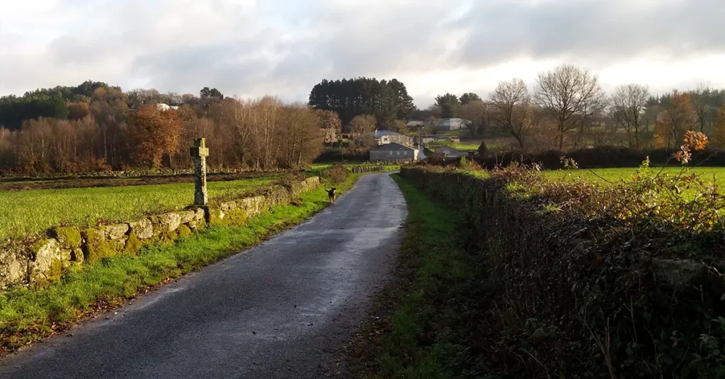 Road amidst field against cloudy sky united Kingdom Countryside