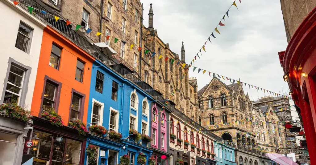 Victoria Street with its medieval houses and shops with brightly colored facades Edinburgh Scotland